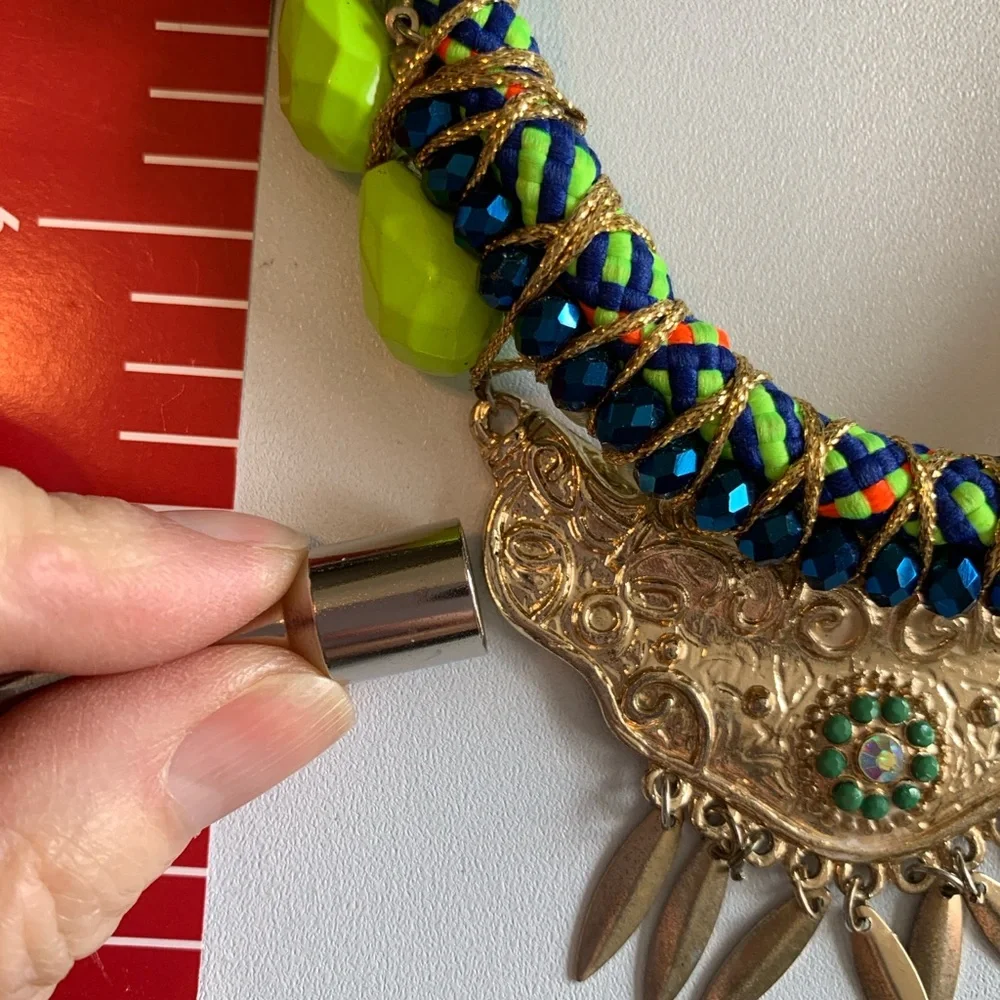 Unique hand made bib necklace in vibrant colors with mixed media.